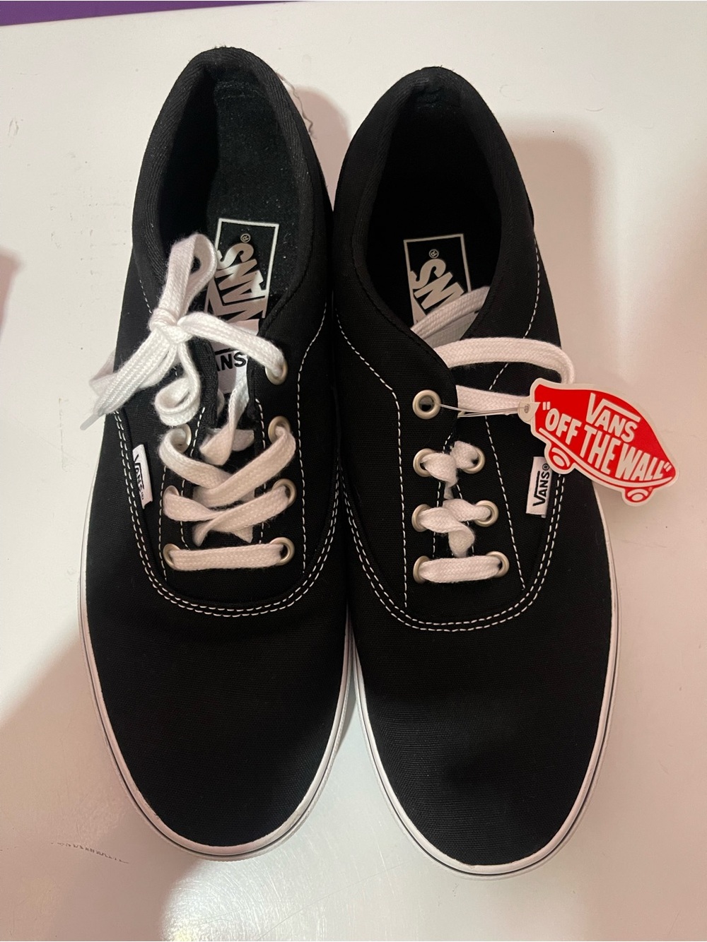 Vans Black and White Classic Canvas Low-Top Sneakers